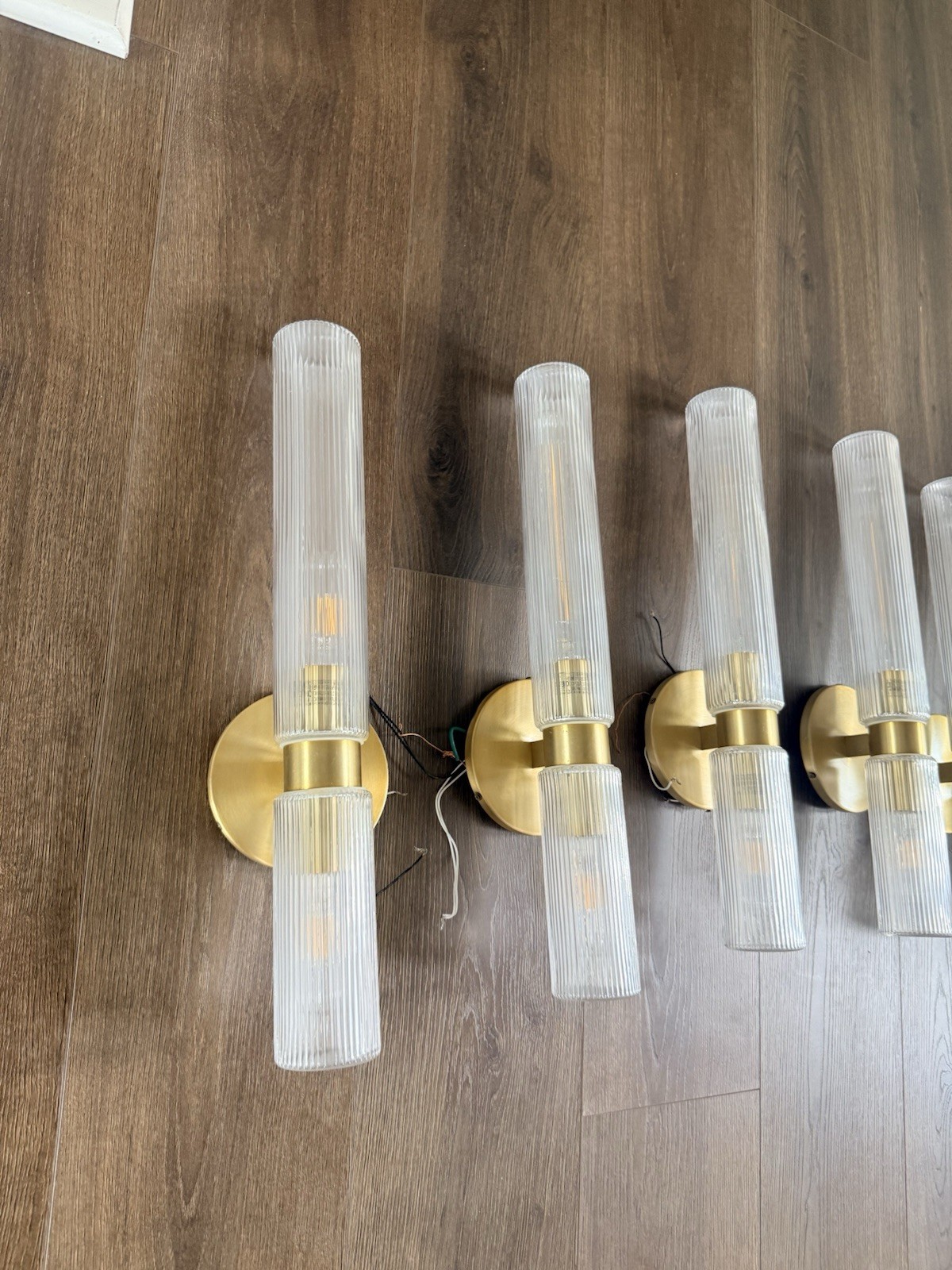 Set of 6 Indoor Wall Sconce Lights Gold Metal Backplate Clear Fluted Glass Shade