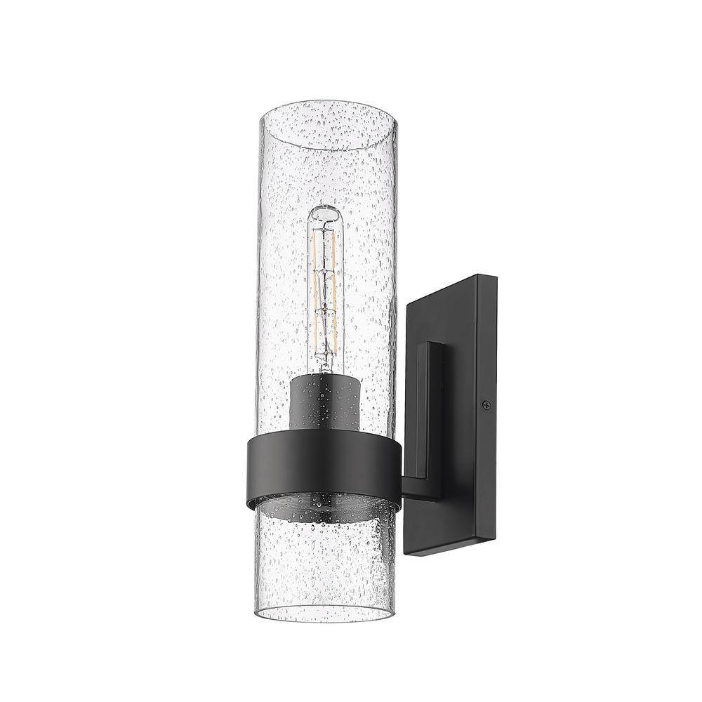 Millennium Lighting 4.75 in. 1-Light Matte Black Sconce Clear Seeded Glass
