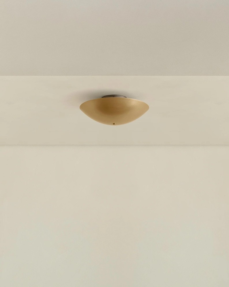 Brass Disc Wall Sconce with Backlight – Modern Ambient Wall Light Fixture