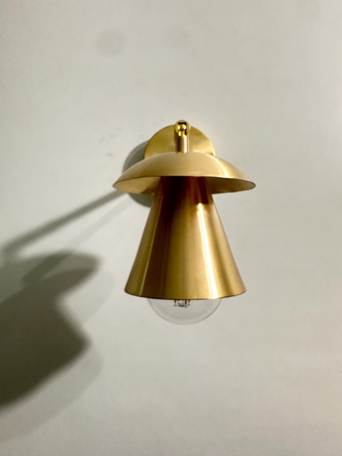 Mid-Century Modern Italian Wall Sconce: Adjustable Raw Brass Cone Shade Lamp
