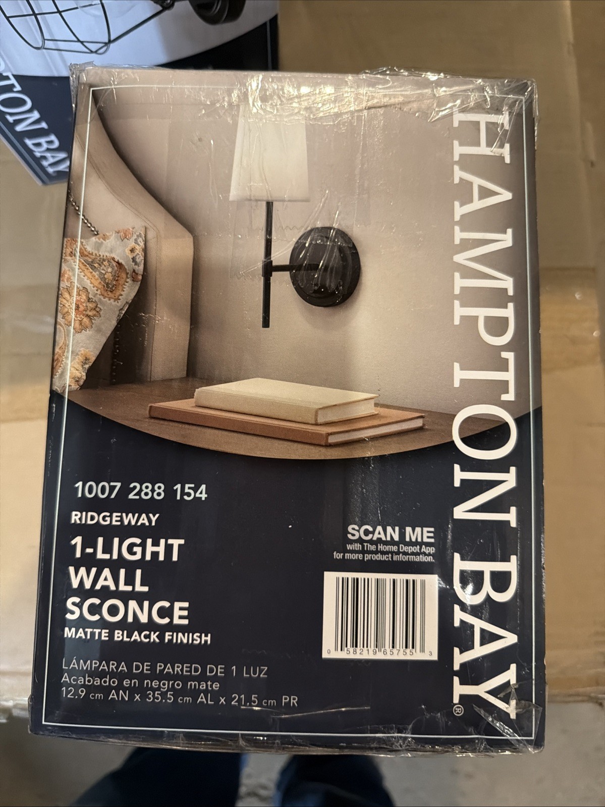 Hampton Bay Ridgeway 1-Light Matte Black Wall Sconce 1007288154. 3L