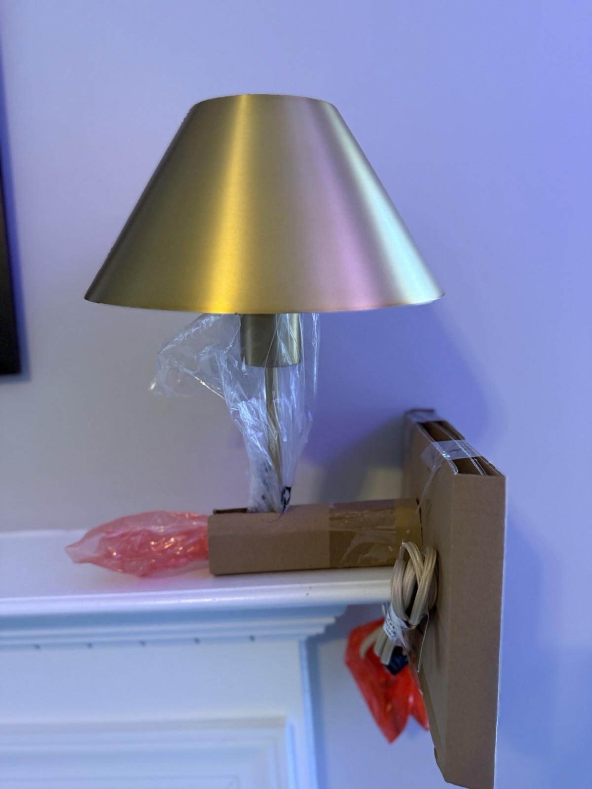 Wall lamp with a conical metal shade and a rotary switch. Color: Gold. New 18 in